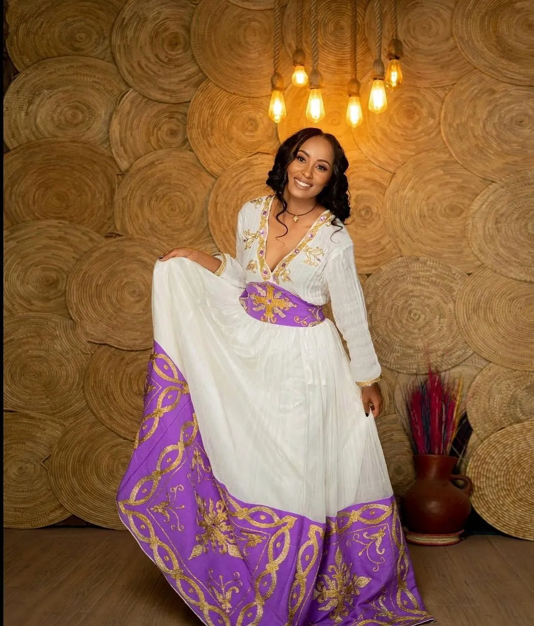 Regal radiance Ethiopian dress purple beaded habesha kemis
