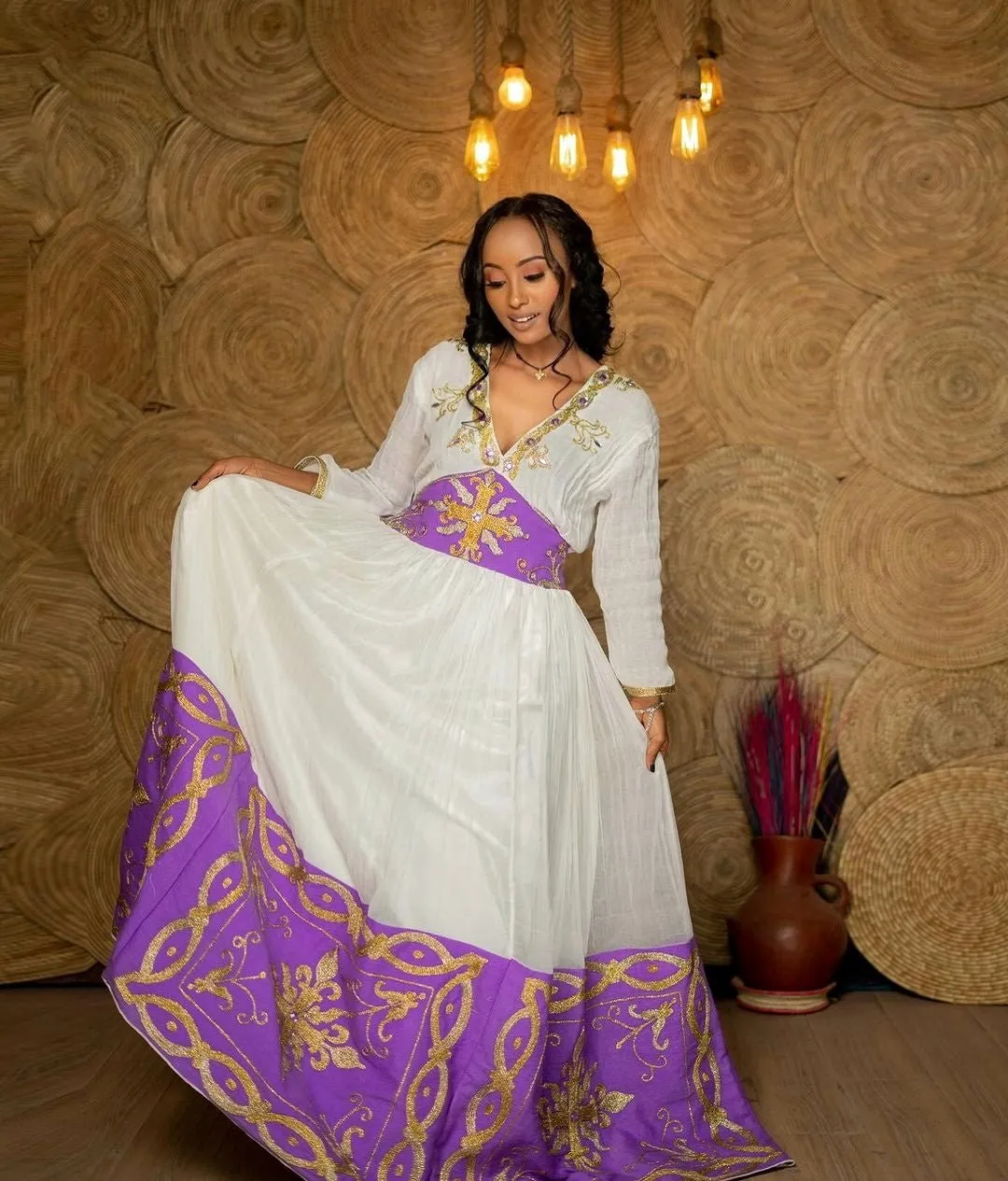 Regal radiance Ethiopian dress purple beaded habesha kemis