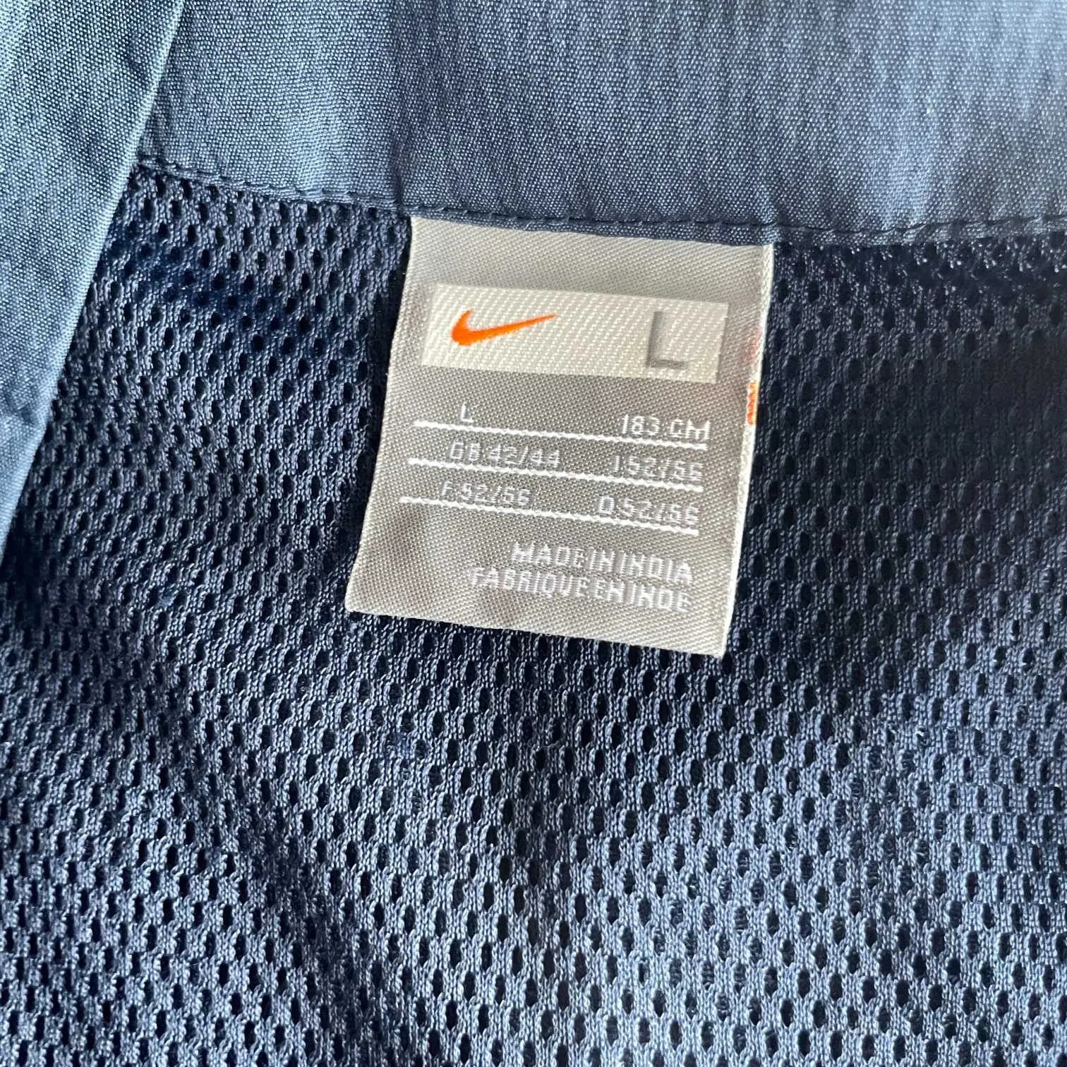 Vintage men Nike navy blue full zip high neck track jacket in L|SKU 5703