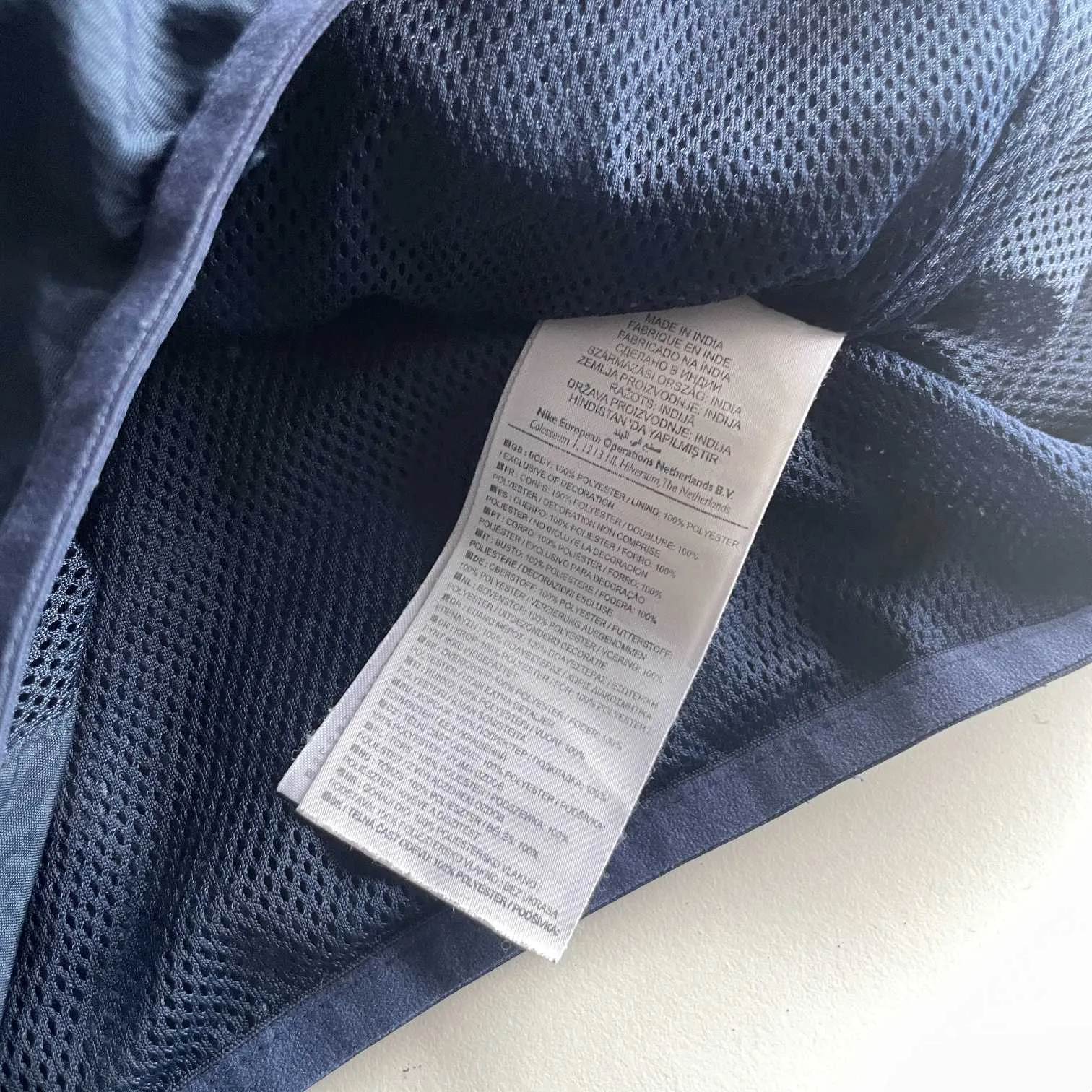 Vintage men Nike navy blue full zip high neck track jacket in L|SKU 5703